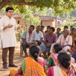 Speakers Rajeev Singh and Sonali Sharma addressing a crowd of local villagers at a Hodopathy tribal health seminar in Simarkothi, Giridih.